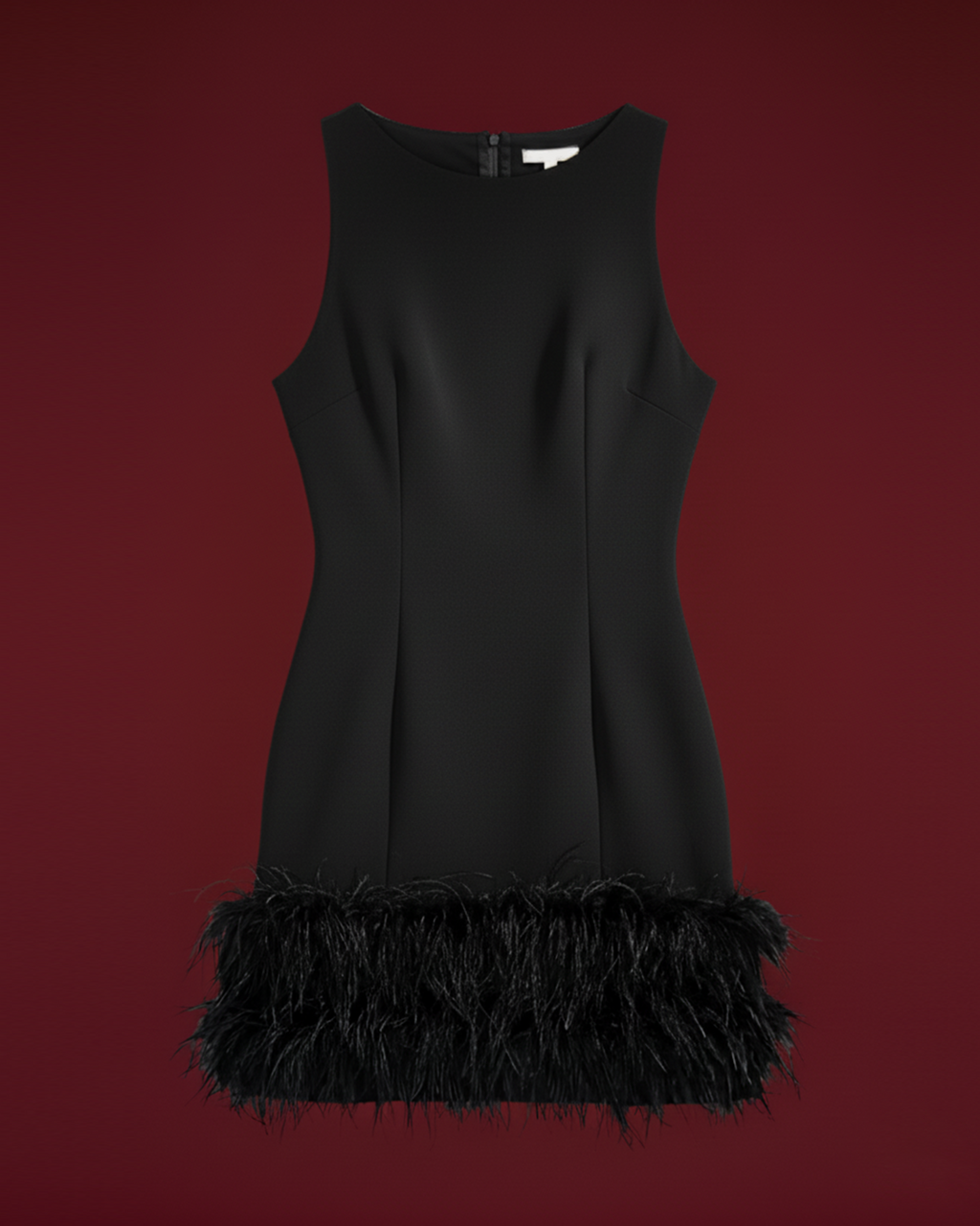 La petite robe noire Nerissa à bordure de plumes 