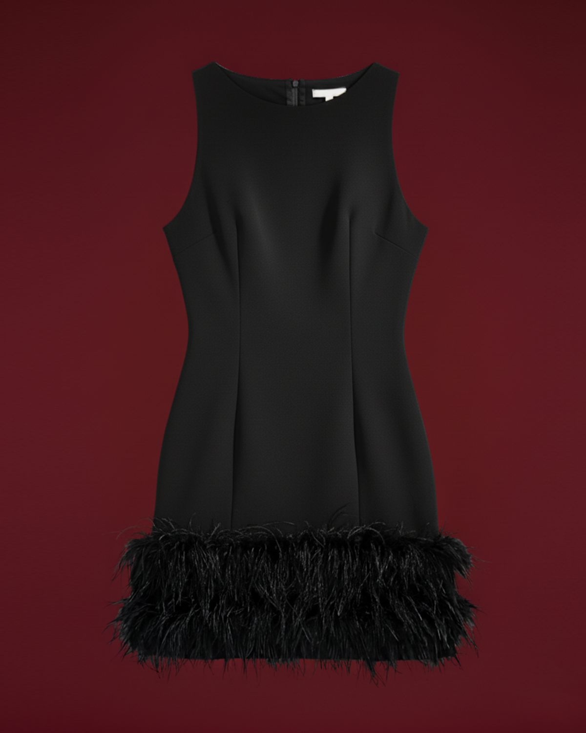 La petite robe noire Nerissa à bordure de plumes 