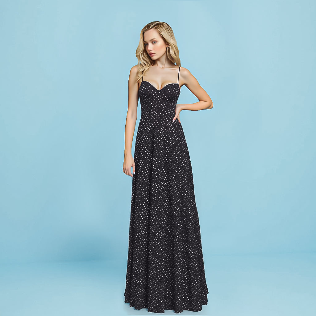 Full view of the Sabine Maxi Dress by Shopise with a fitted bodice, sweetheart neckline, and gently flowing polka dot skirt